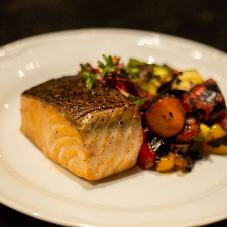 Grilled salmon fillet with a seasoned crust
